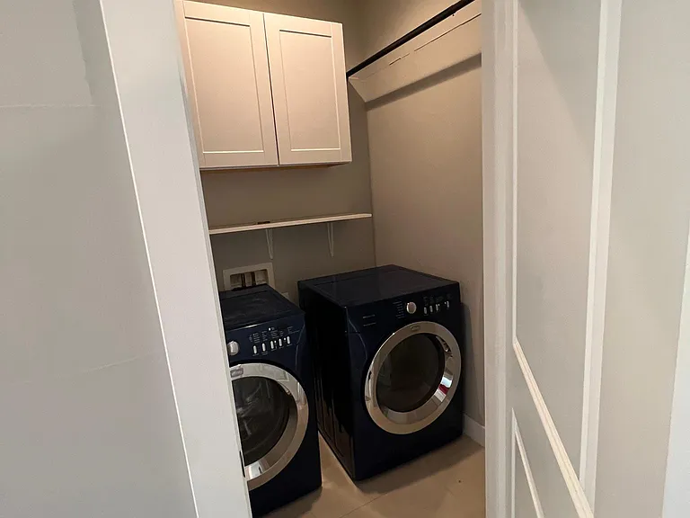 The laundry room is on the second level between the master and guest rooms (New washer & dryer included).