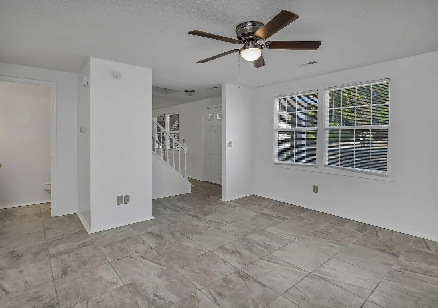 Spacious 3BR Home with Covered Front Porch & Expansive Backyard Near Dining & Shopping — Photo 4