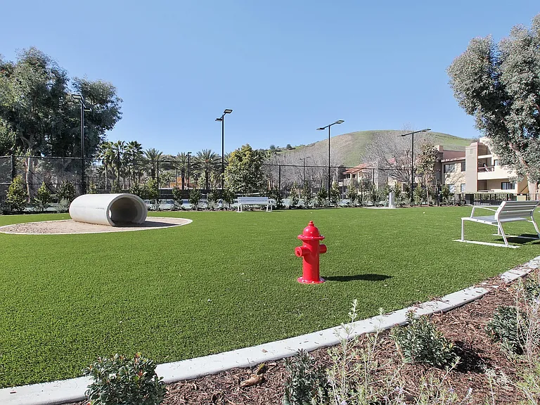 Onsite fenced-in dog park with plenty of room to let your furry friends run