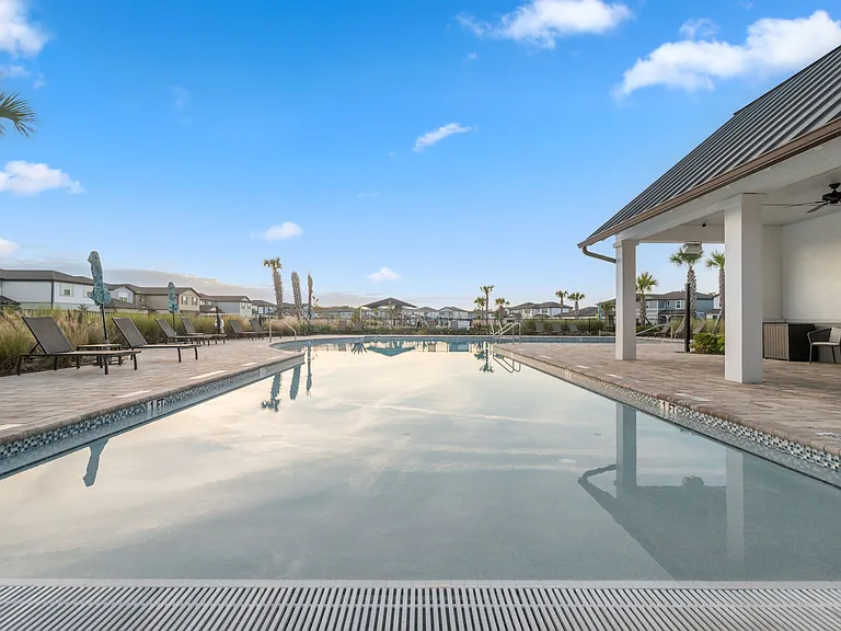 Enjoy the community pool just steps from the home!