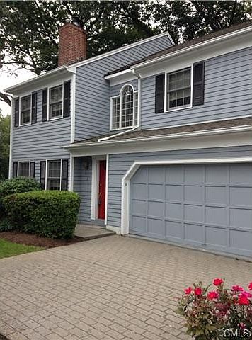 2 car garage and brick driveway