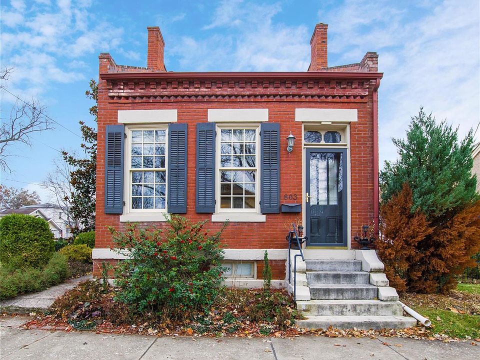 Welcome home! You'll be proud to come home to your stately full-brick home. The front street view has a distinguishing roof line, architectural brick detail, tall windows flanked by shutters, transom window above door and welcoming front steps/stoop to sit and enjoy the historic neighborhood.