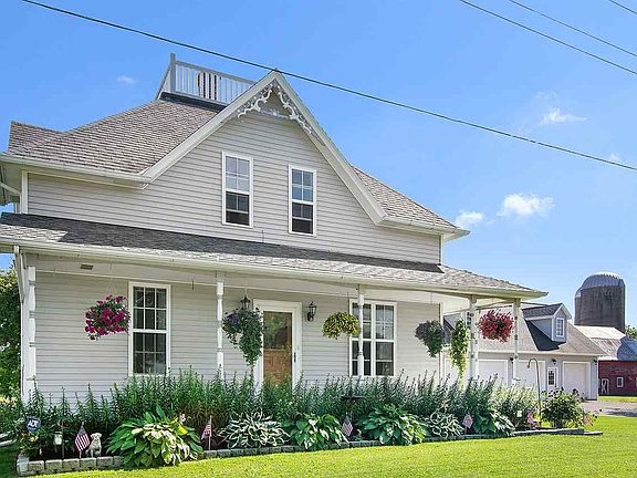 Home 4 stall garage and barn view