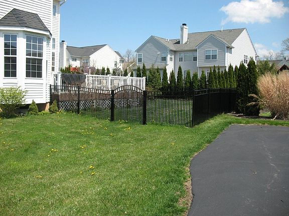 Iron Fence with narrow slots.