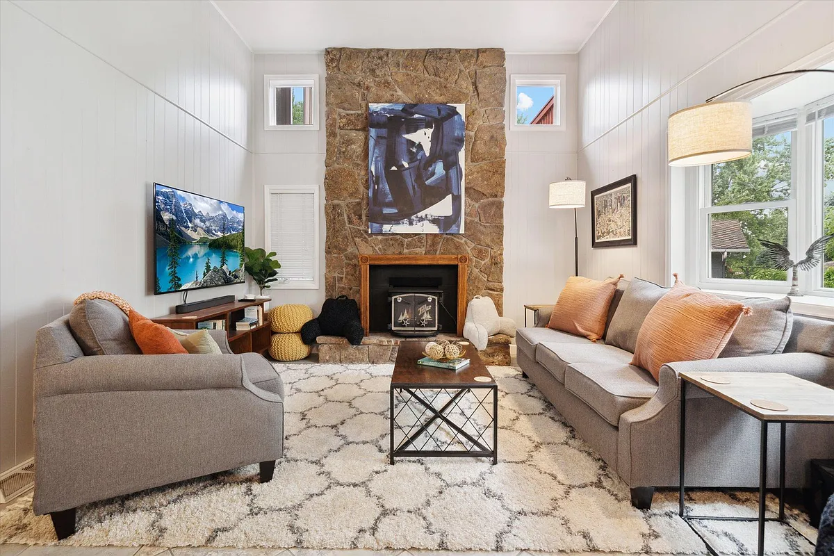 Living Room 1 of 2. Mounted big screen TV -- bring your own streaming services! - 2505 S Cody Way