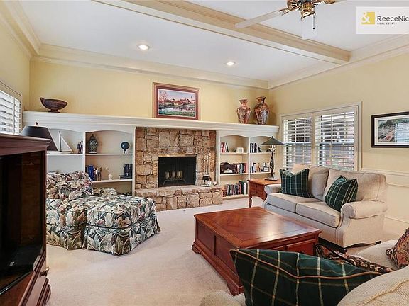 Large formal Living Room with stone fireplace