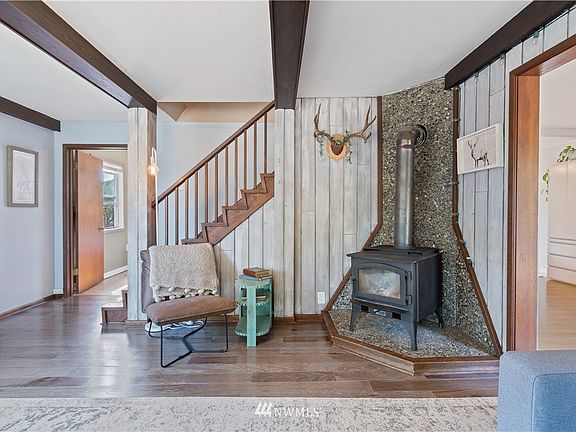 First look at the cozy and welcoming living room!