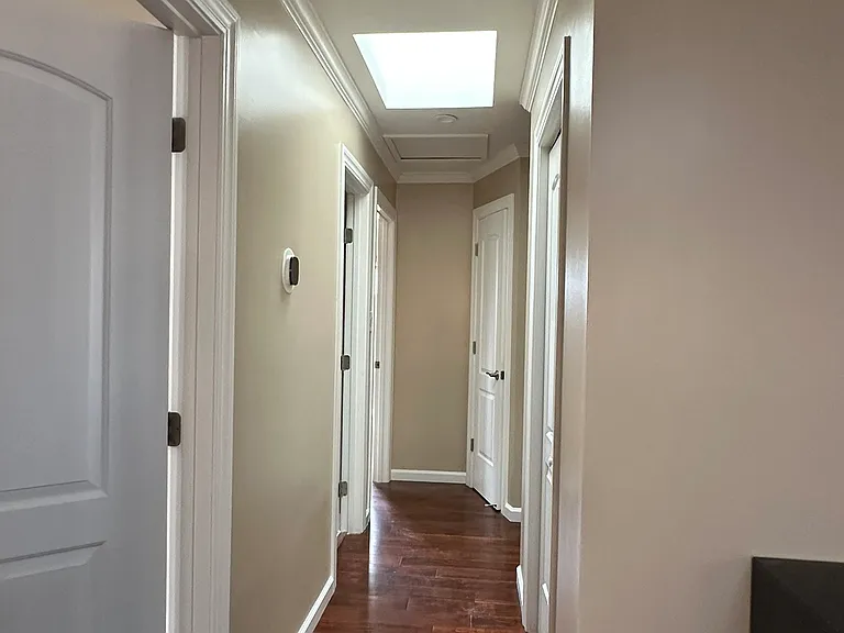 Hallway leading to bedrooms