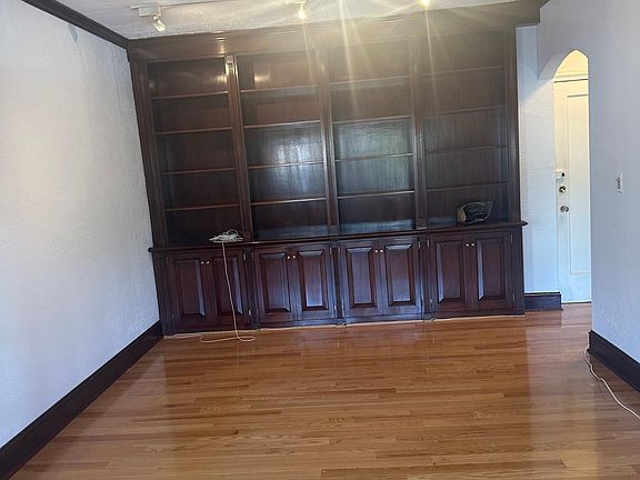 LR with wall of bookcases