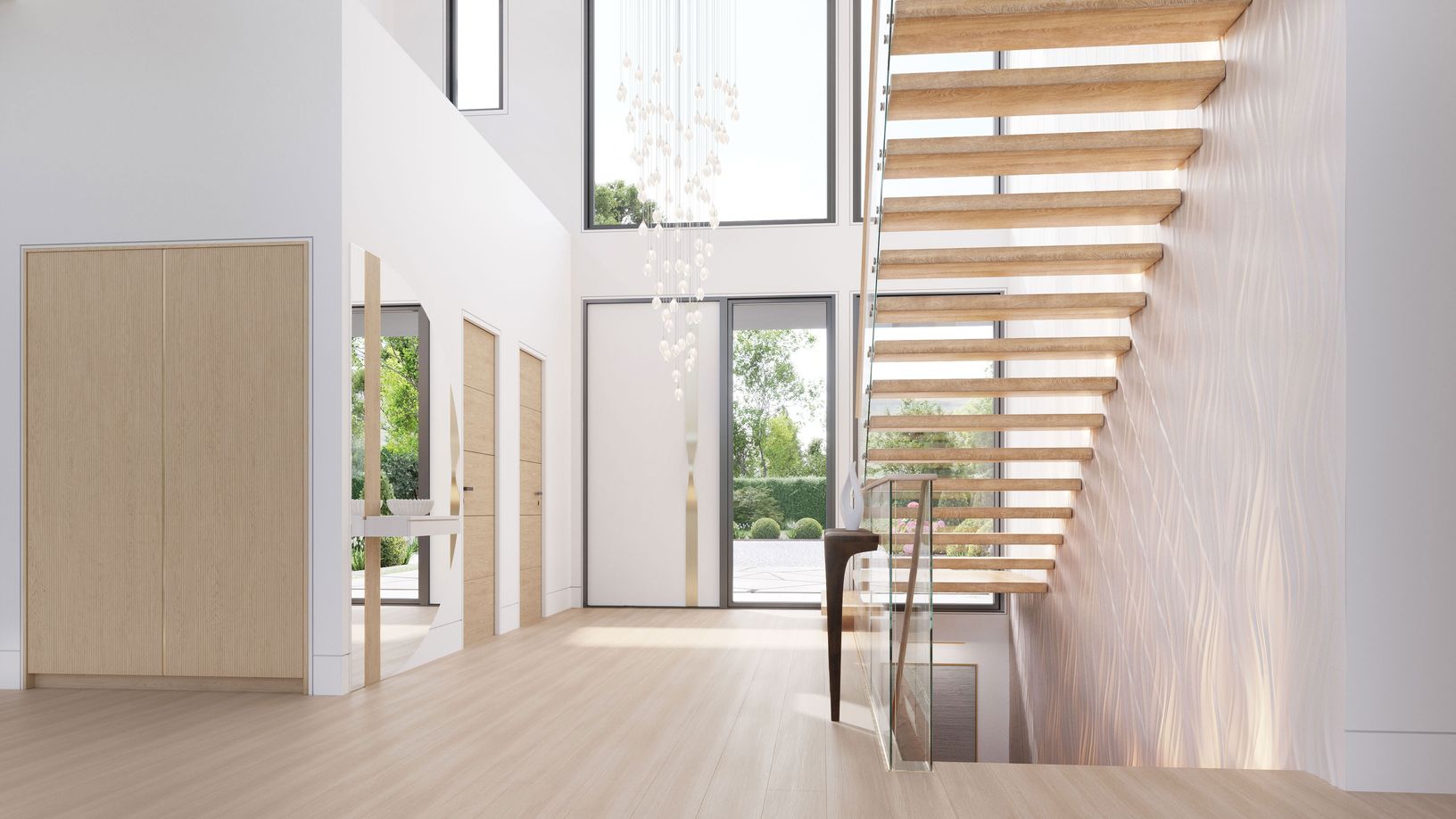 A striking custom pivot door opens to a light-filled foyer defined by floating stairs