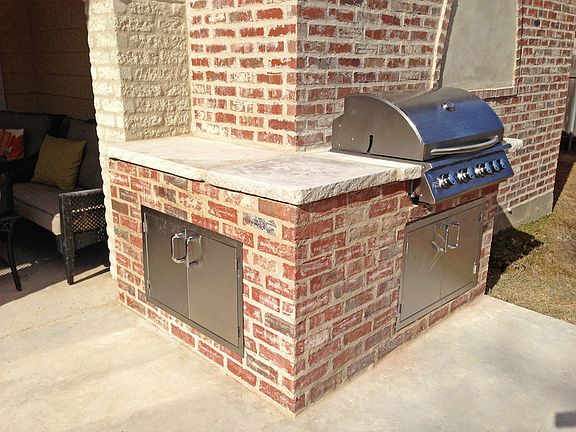 Outdoor Grill : Fire up your steaks w/ this stainless grill. Comes with plenty of storage