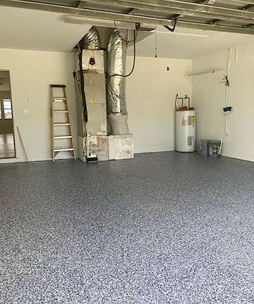 Freshly painted garage and epoxy floor.