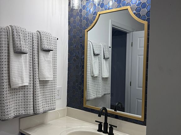 Master bath with step him shower and walkin closet