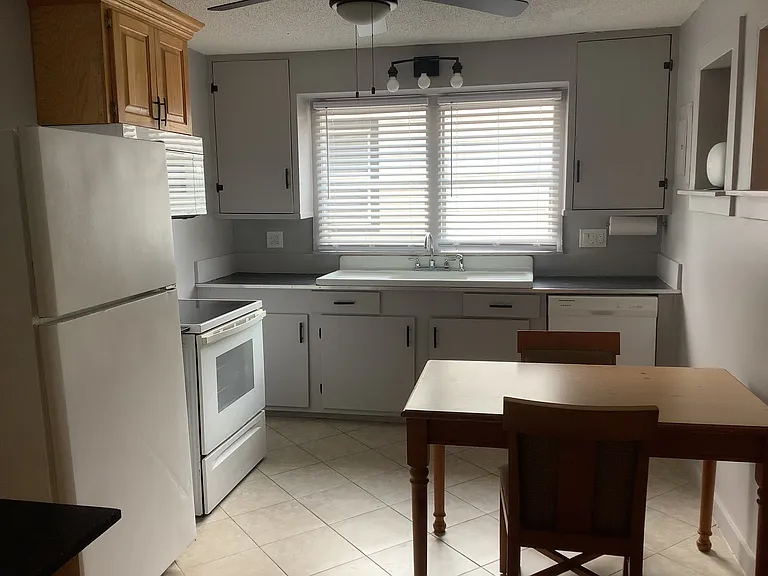 EAT IN KITCHEN WITH DISHWASHER AND BLT- IN MICROWAVE