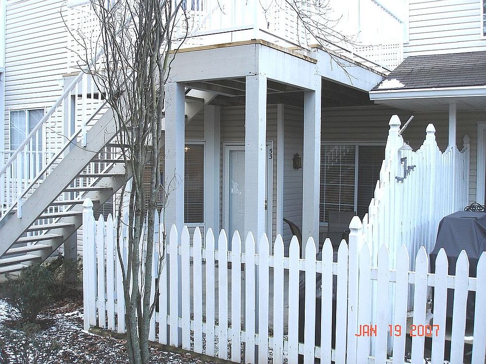 Front Door and Patio - Note the White Picket Fence