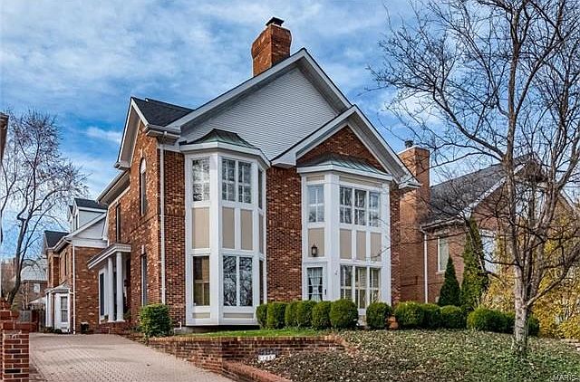 Welcome to 143 N. Bemiston Ave. - A wonderful front unit of a two unit condominium located in Old Town Clayton just steps from downtown Clayton.