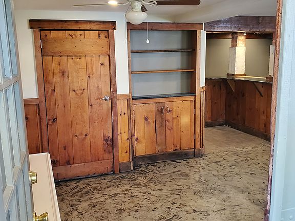 Entrance into apt. showing a closet and storage