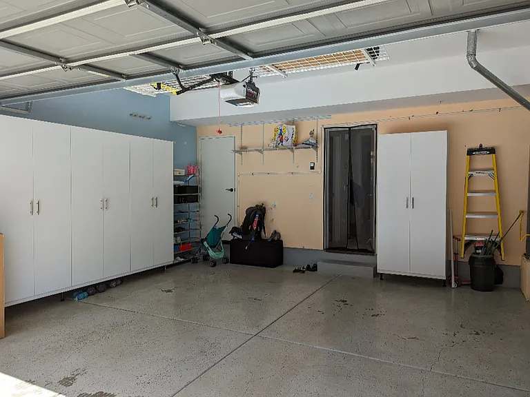 Garage with built in storage cabinets