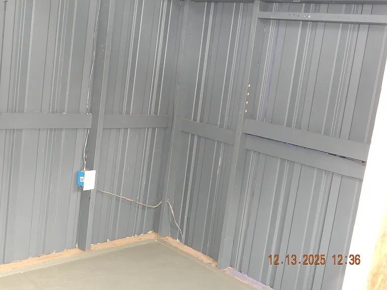 Inside wall of 2nd large storage building, Notice electrical hook-up.