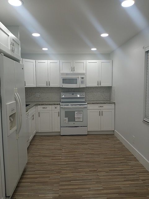1st image of 4221 W Palm Aire Dr APT 205