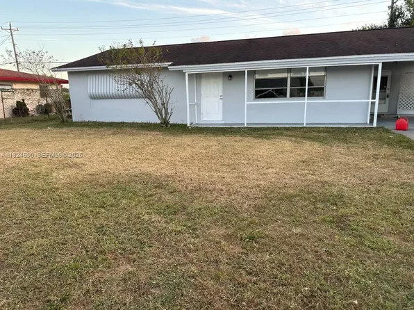 1418 Kimdale St E, Lehigh Acres, FL 33936