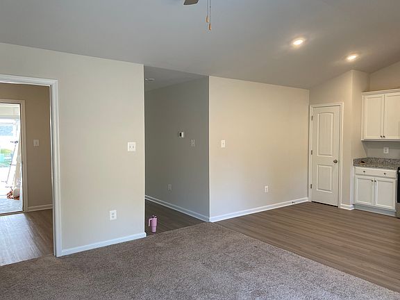 Hallway leading to kitchen and living room