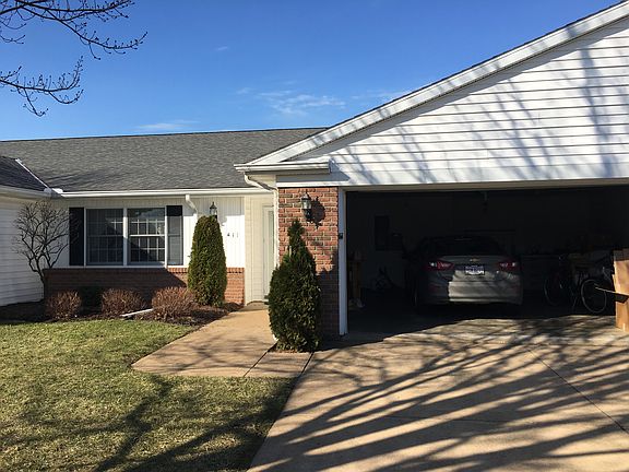 Front with view of garage