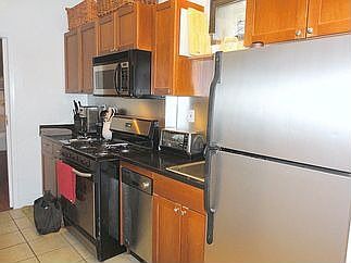 4th image of 411 W 50th St APT 1D