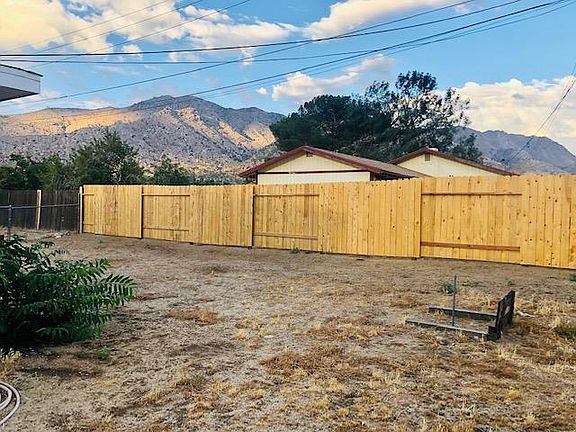 Backyard with horseshoes and mountain views