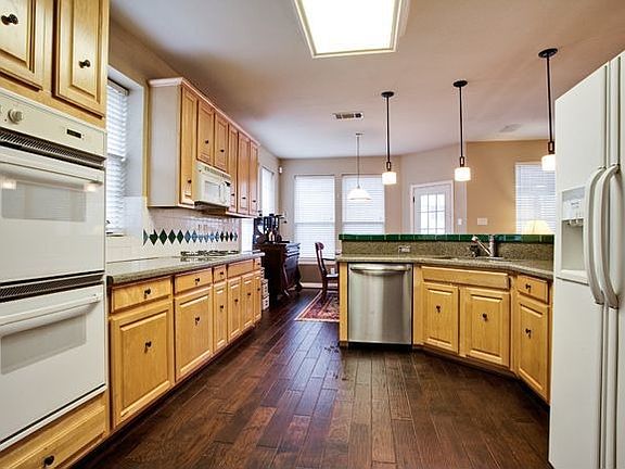 5th image of 8816 High Meadows Dr