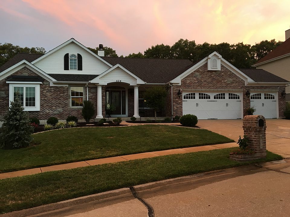 New Brick Front & Garage Doo