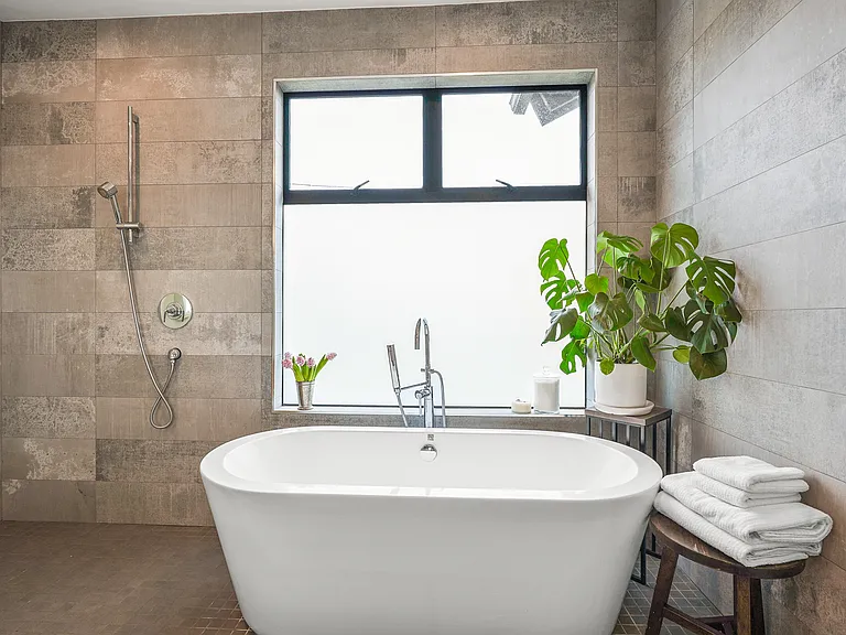 Soaking tub in primary suite