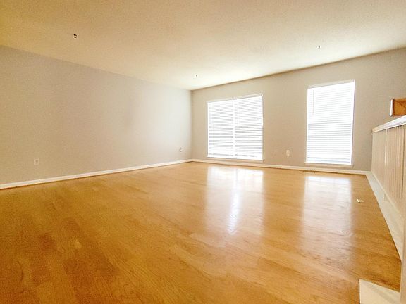Large living room with hardwood floors.