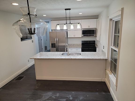 New Appliances cabinets and granite counters.