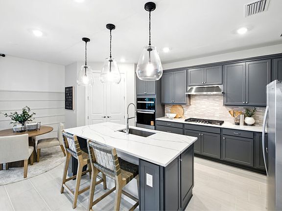 Spacious kitchen with stainless steel appliances