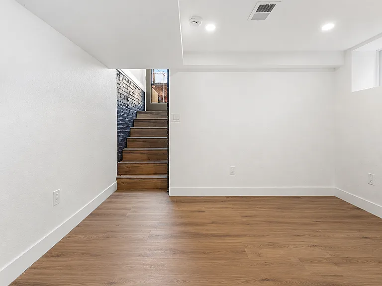 Downstairs rec room currently under construction.
**AI-generated image to represent end result vision.