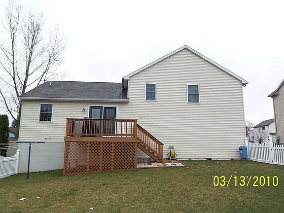 Rear with backyard deck