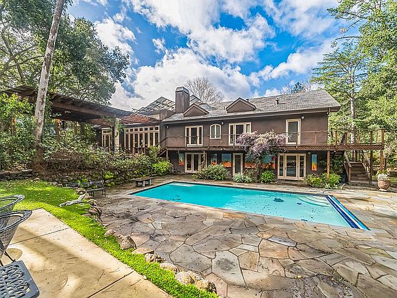 Pool and house