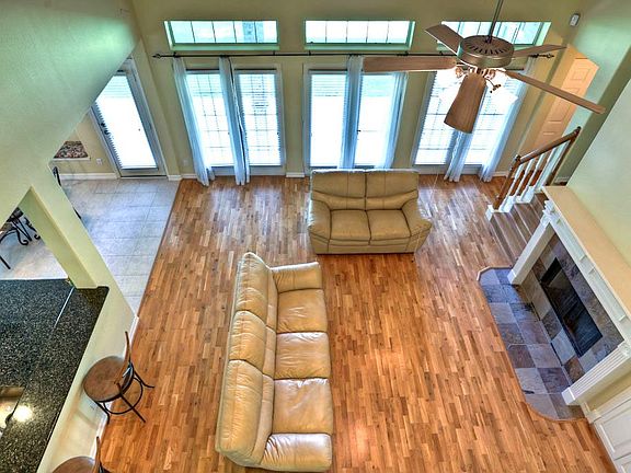 This is a shot from the upstairs looking down to the Cozy Living Room
