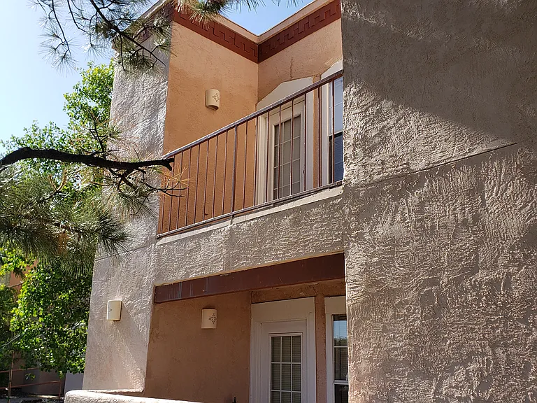 Private 2nd floor balcony provides a little outdoor oasis and overlooks the community trail system for walking, running and biking.