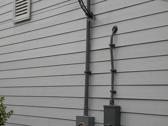 Updated electrical with increased capacity.  Hardieplank enclosed garage.