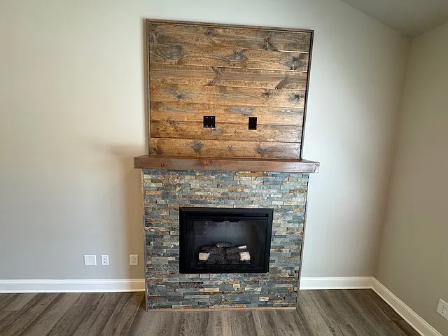 Fireplace with Stone Surround in Living Area