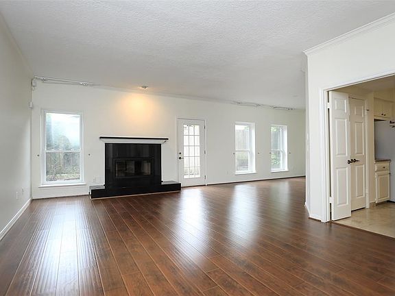Gleaming new flooring in the living and dining room.