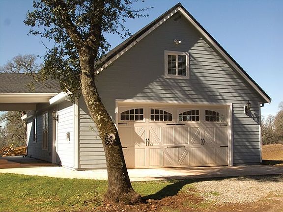 50' x 26' garage with additional, side, roll up doors