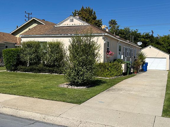 Front yard and driveway to garage