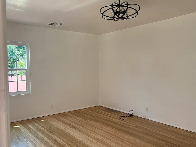 Spacious, well-lit living room.