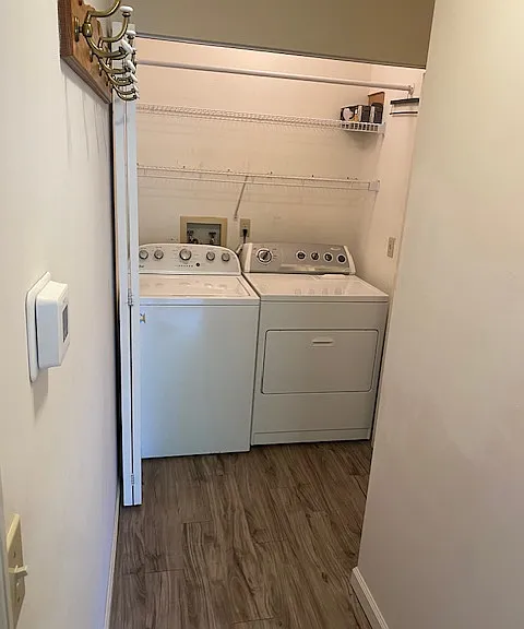 Washer and dryer. Doors can be closed to hide washer and dryer.