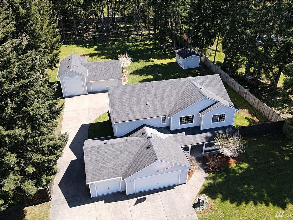 Beautiful & Impressive. One-of-a Kind!  Inside and Out.  Saying this, is the "Total Package" is an Understatement!  Lovely country setting, very close to JBLM & close enough to 'Town', very nice, gated neighborhood, great big one acre homesite, fenced yard, large deck, storage shed, enormous detached garage/shop, RV parking, extra deep 3 car attached garage, spacious front porch, expansive concrete areas... You're gonna love this property!  Wonderful interior living space includes 3/4 bedroom's (den option) & very cool & flexible living spaces... Fantastic kitchen and owner's suite, spacious secondary bedrooms, upstairs laundry, plenty of storage... Beautiful updates.  Impressive one owner, well-cared for home.
