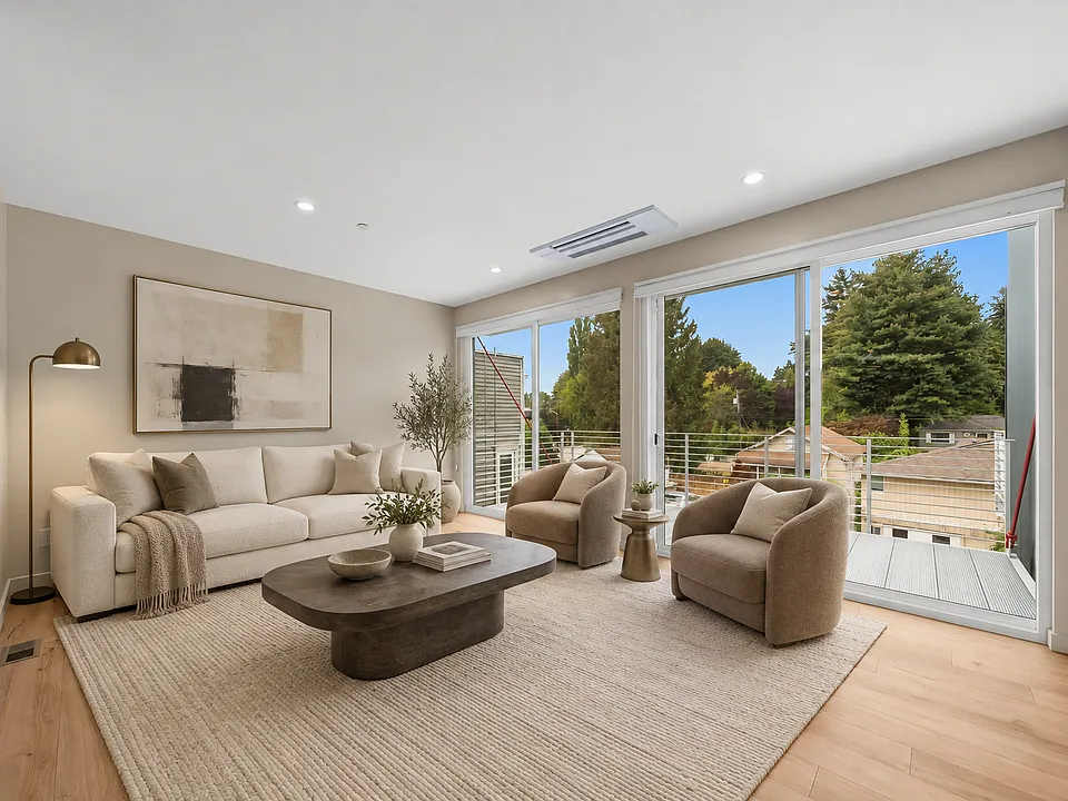 Living room looking towards deck (virtually staged)