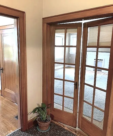 Double doors from landing allow living room closure